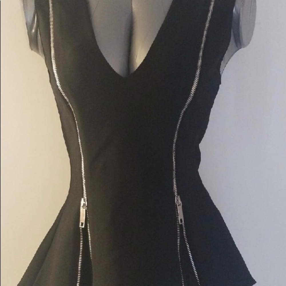 Zara- Sz L Top. Black with zippers in the front. Dress up or Dress down.